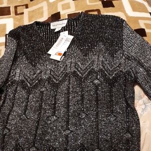 Glittering long sleeved sweater.